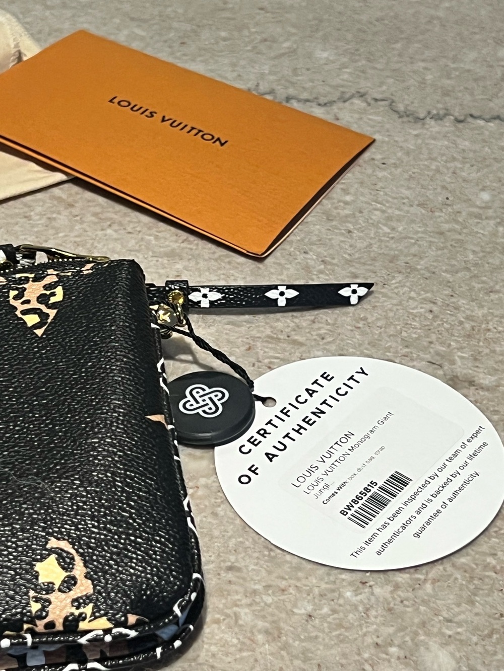 LOUIS VUITTON
Double Zip Jungle Pochette Giant Monogram Leather Crossbody Bag - Picture 7 of 15